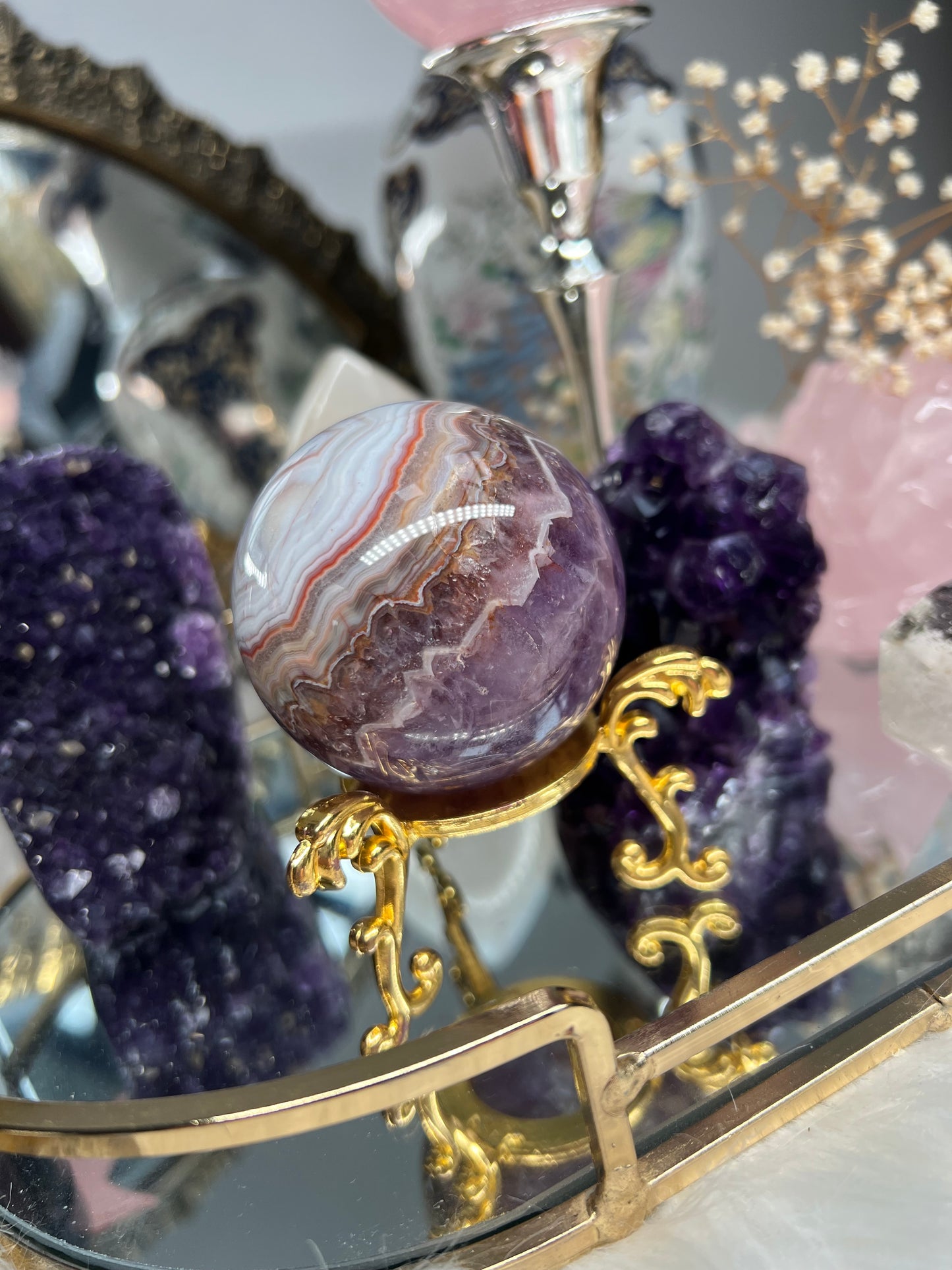 Mexican crazy lace agate with amethyst sphere