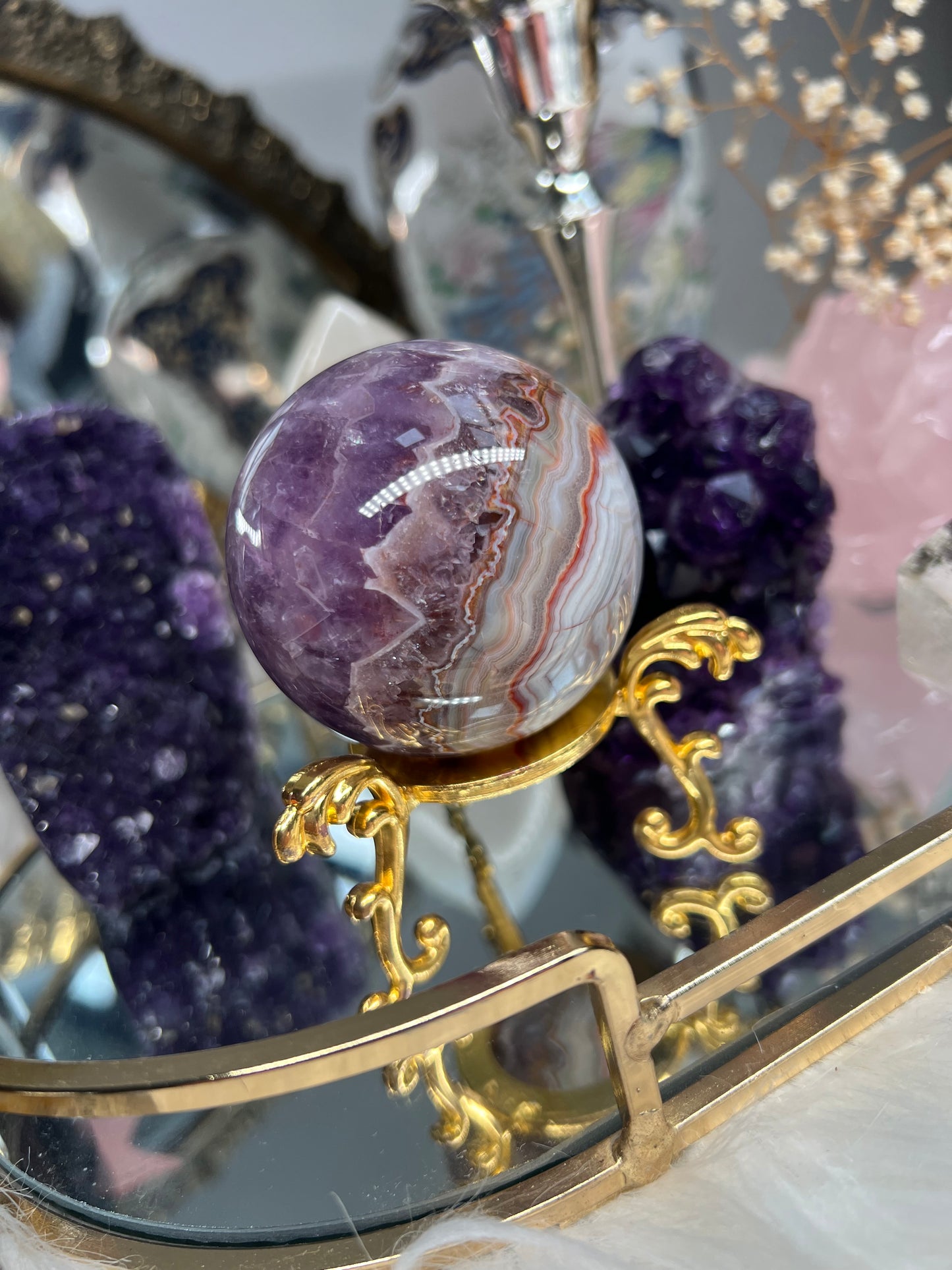 Mexican crazy lace agate with amethyst sphere