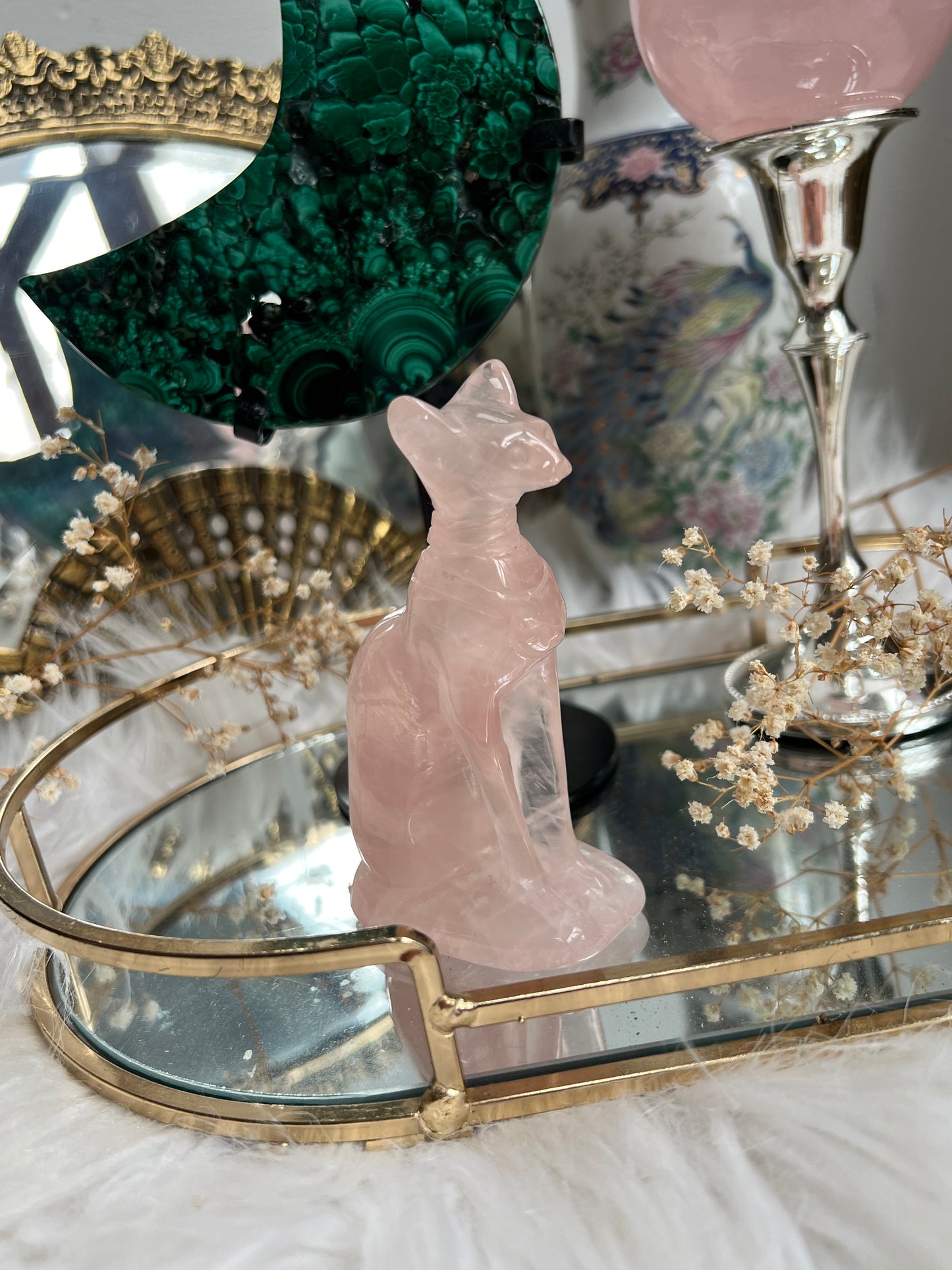 Rose quartz sphinx carving