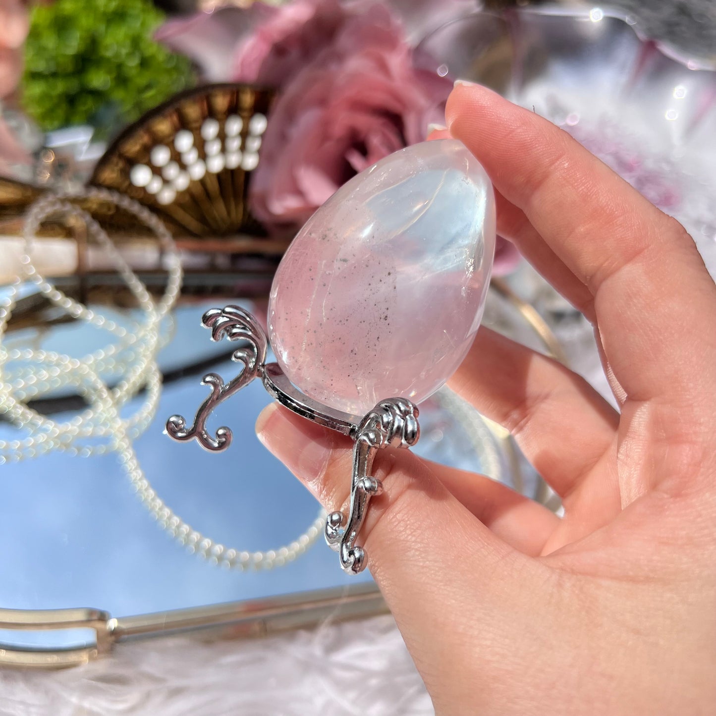 Mozambique Rose Quartz with pyrite inclusions egg carving