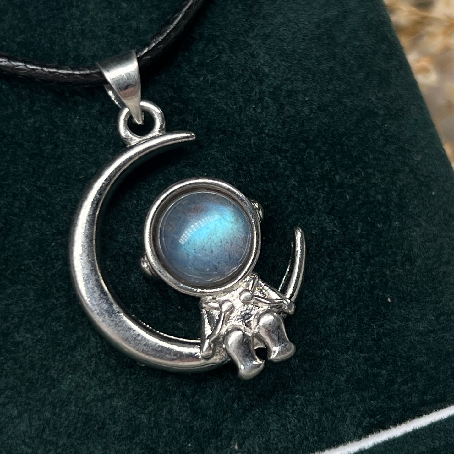 Labradorite astronaut on moon pendant