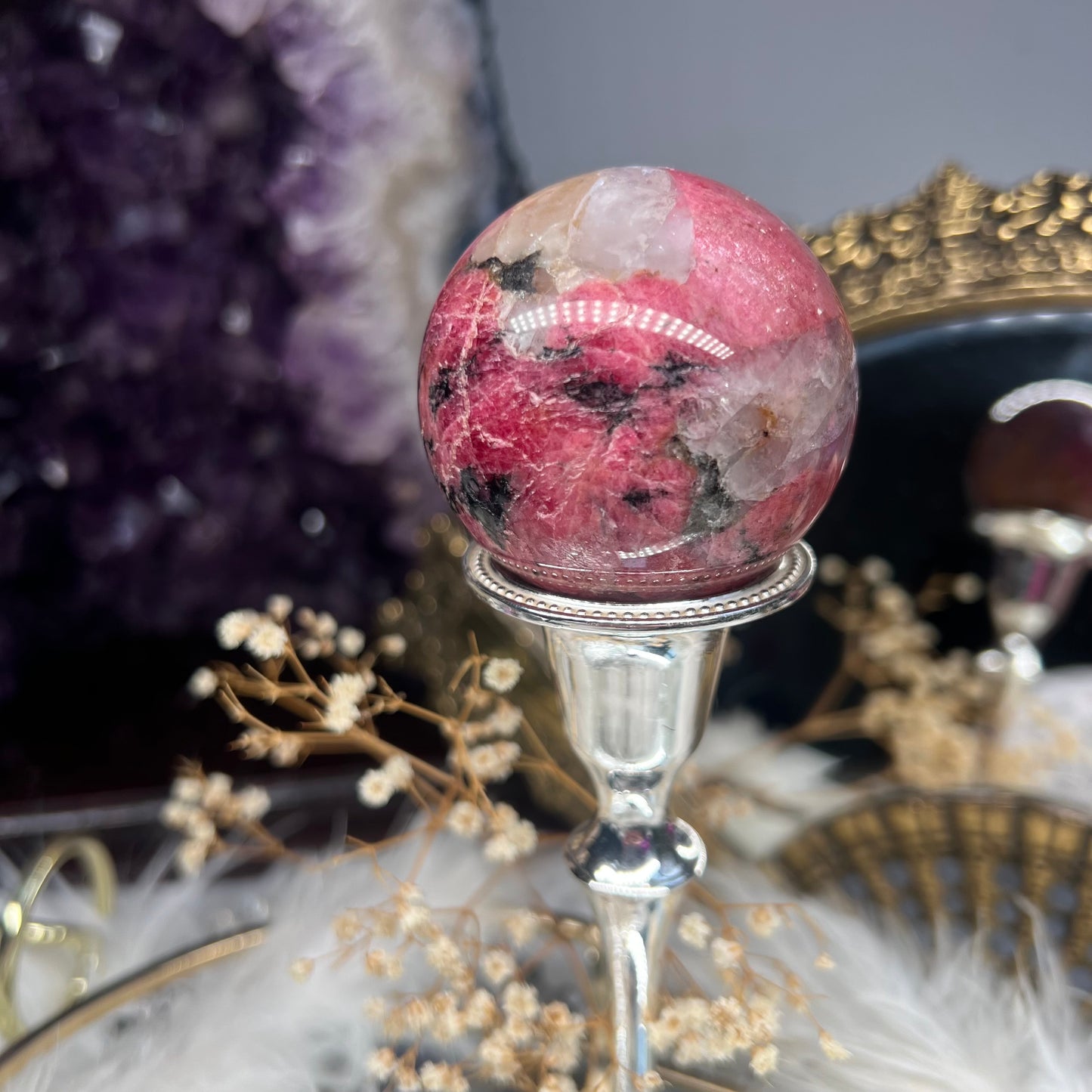 Rhodonite flashy sphere with quartz inclusions