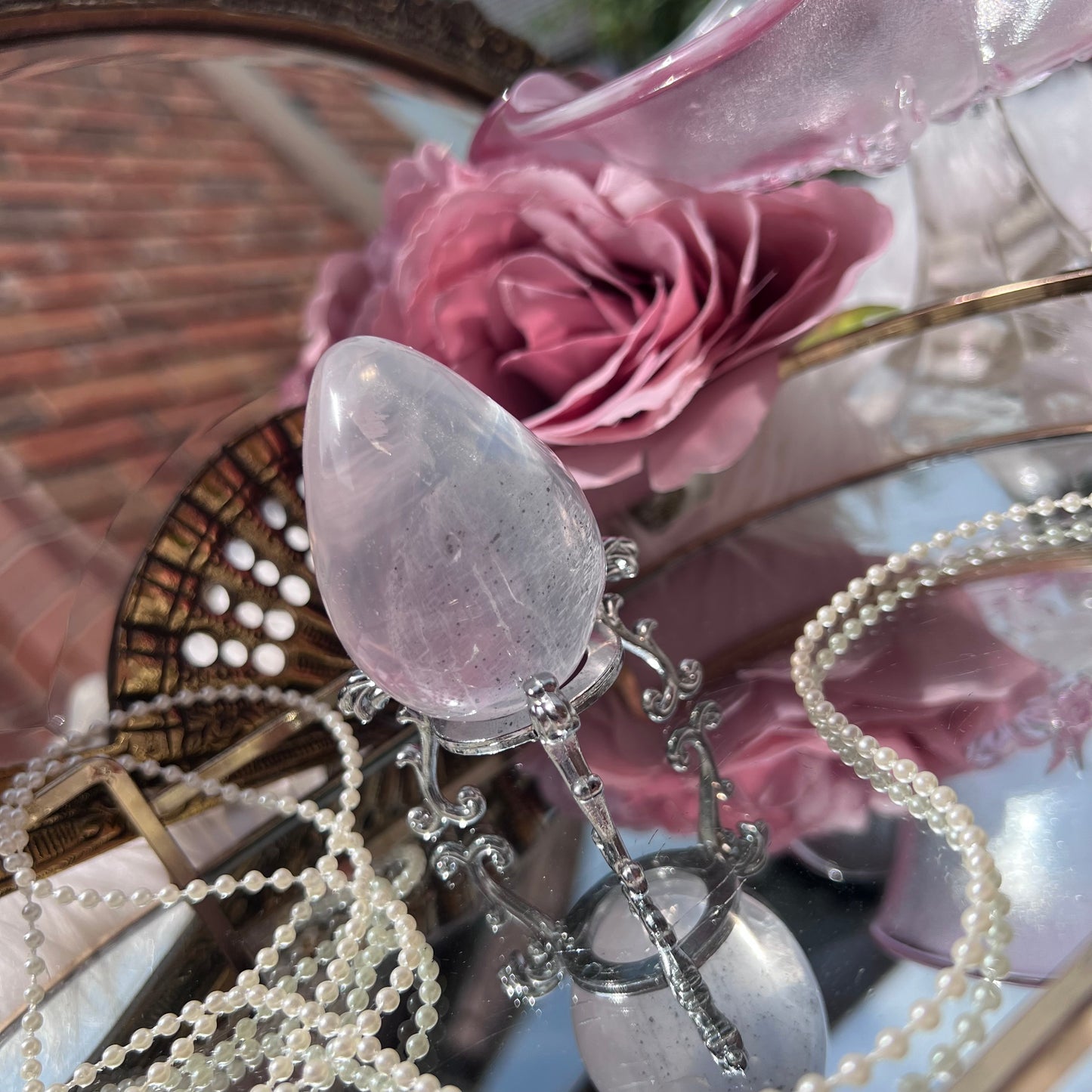 Mozambique Rose Quartz with pyrite inclusions egg carving