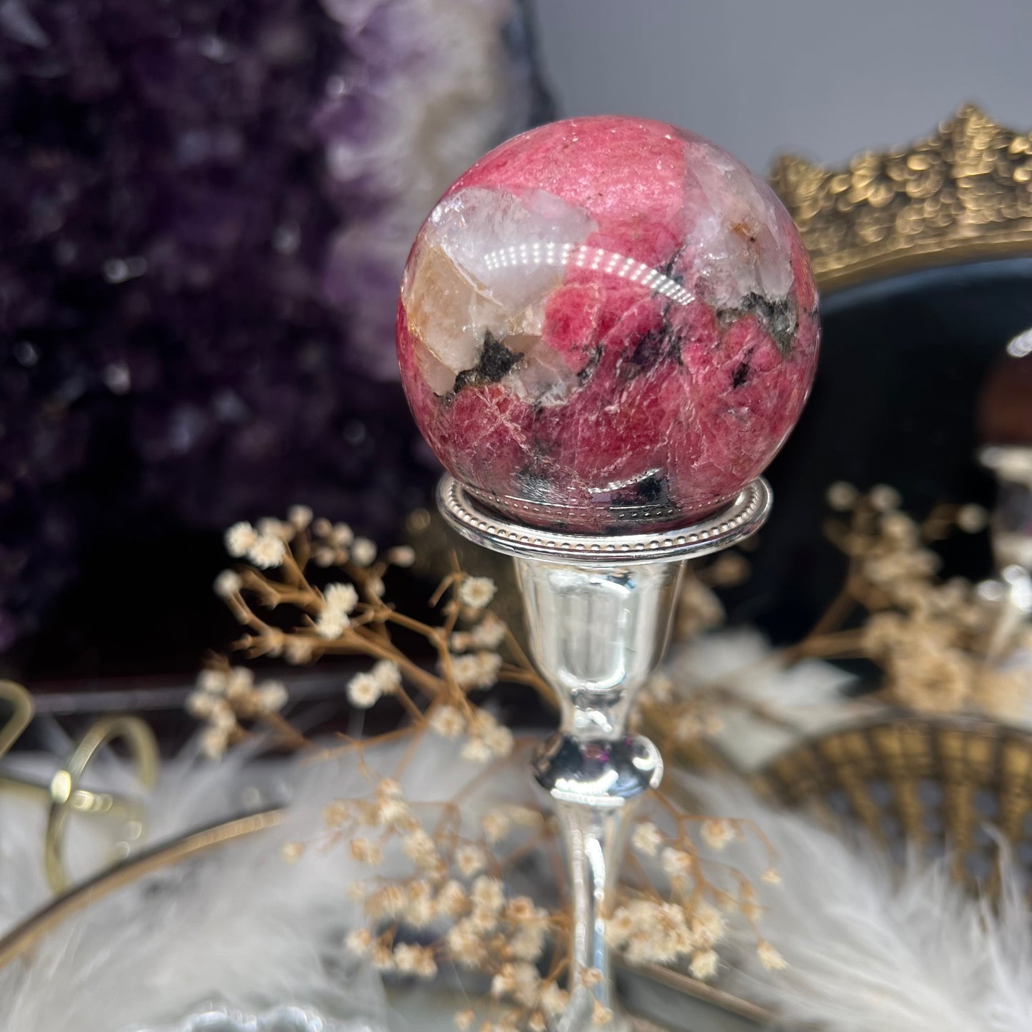 Rhodonite flashy sphere with quartz inclusions