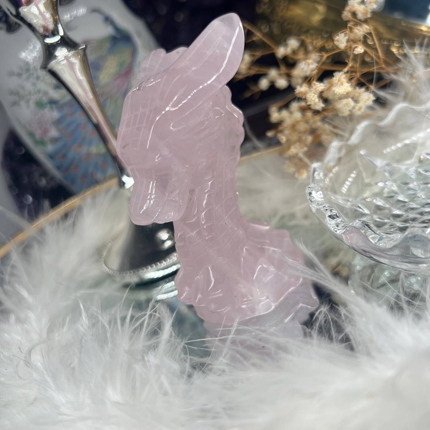 Rose quartz dragon head carving