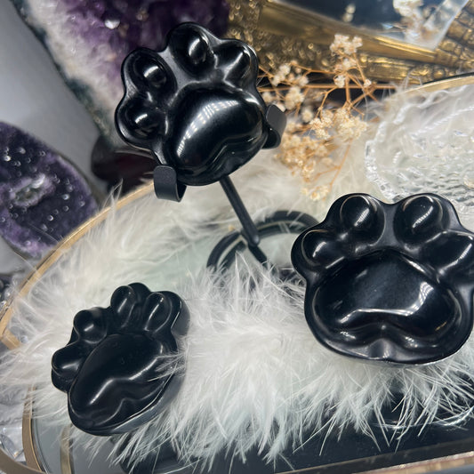 Obsidian pet paw carving