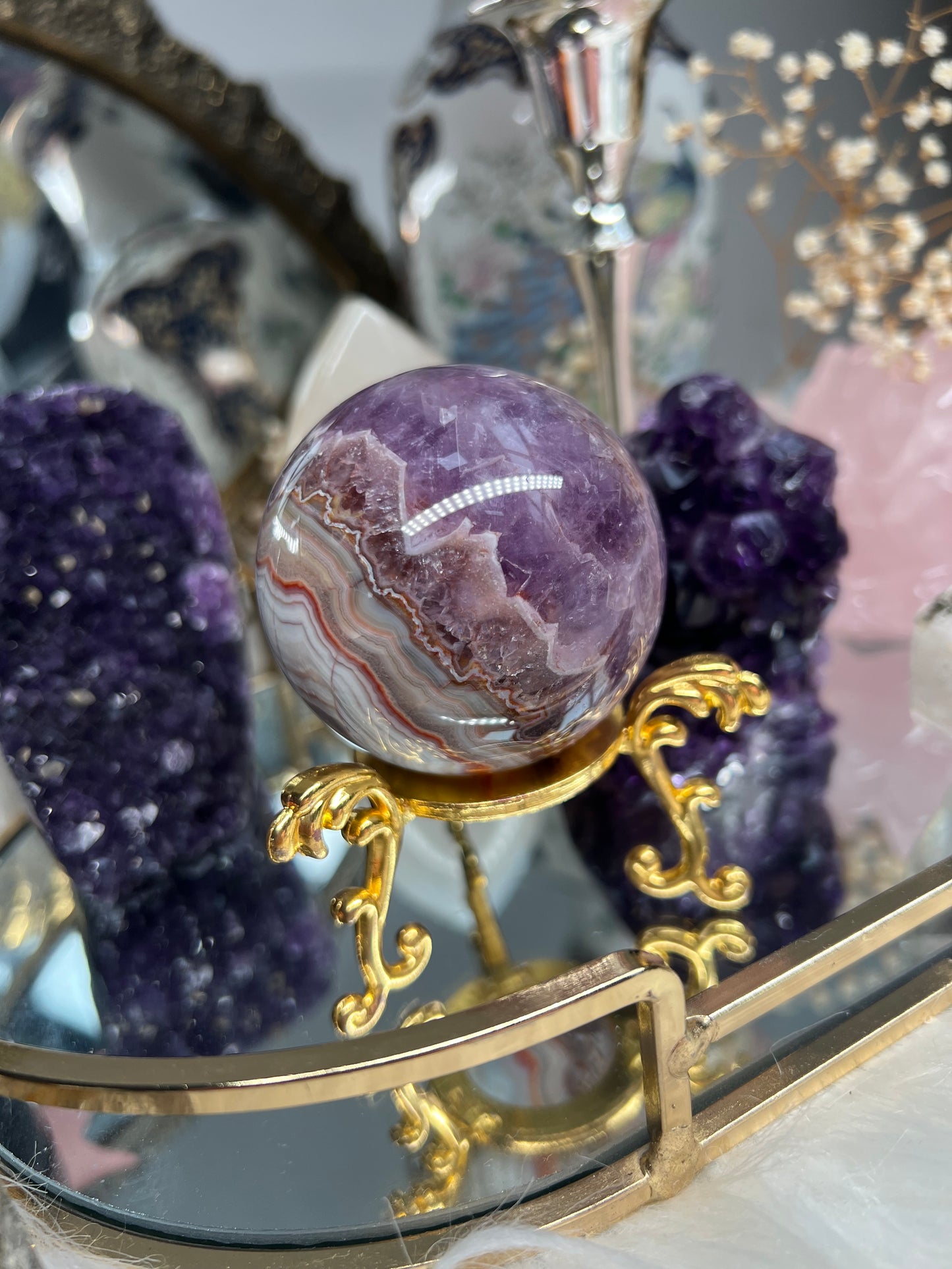 Mexican crazy lace agate with amethyst sphere