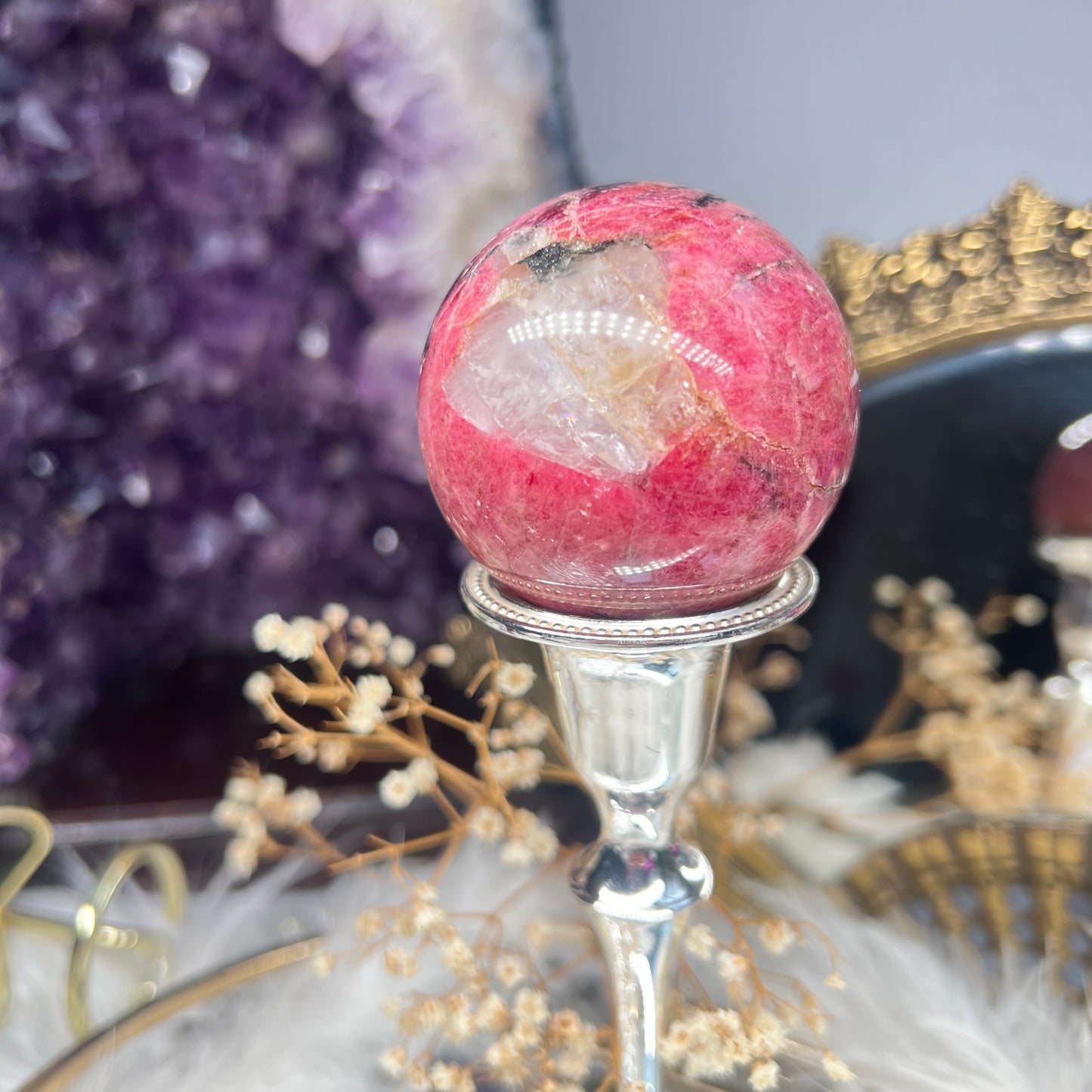 Rhodonite flashy sphere with quartz inclusions