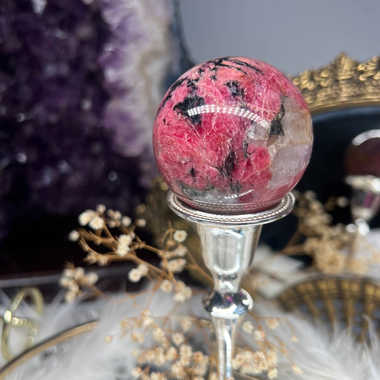 Rhodonite flashy sphere with quartz inclusions