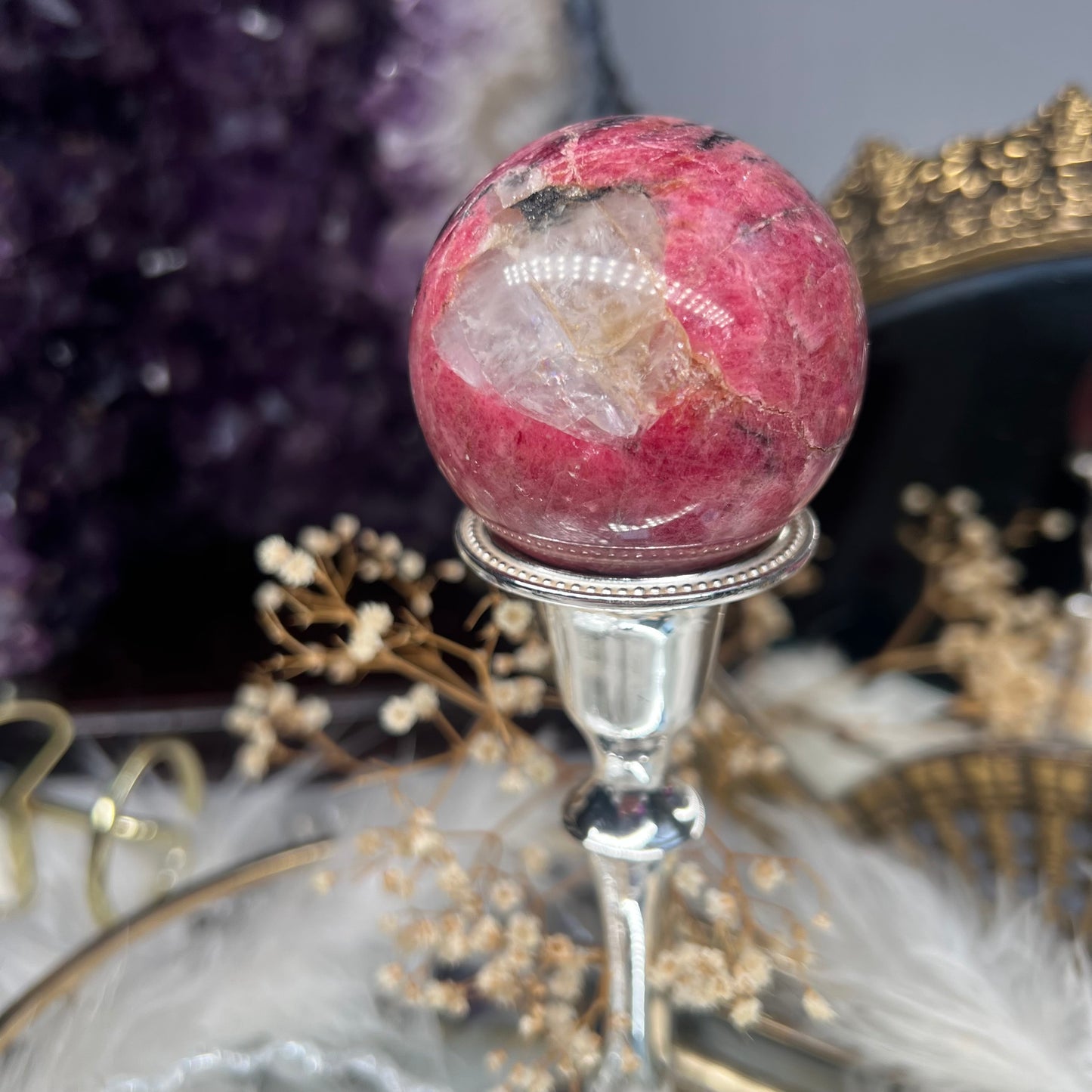 Rhodonite flashy sphere with quartz inclusions