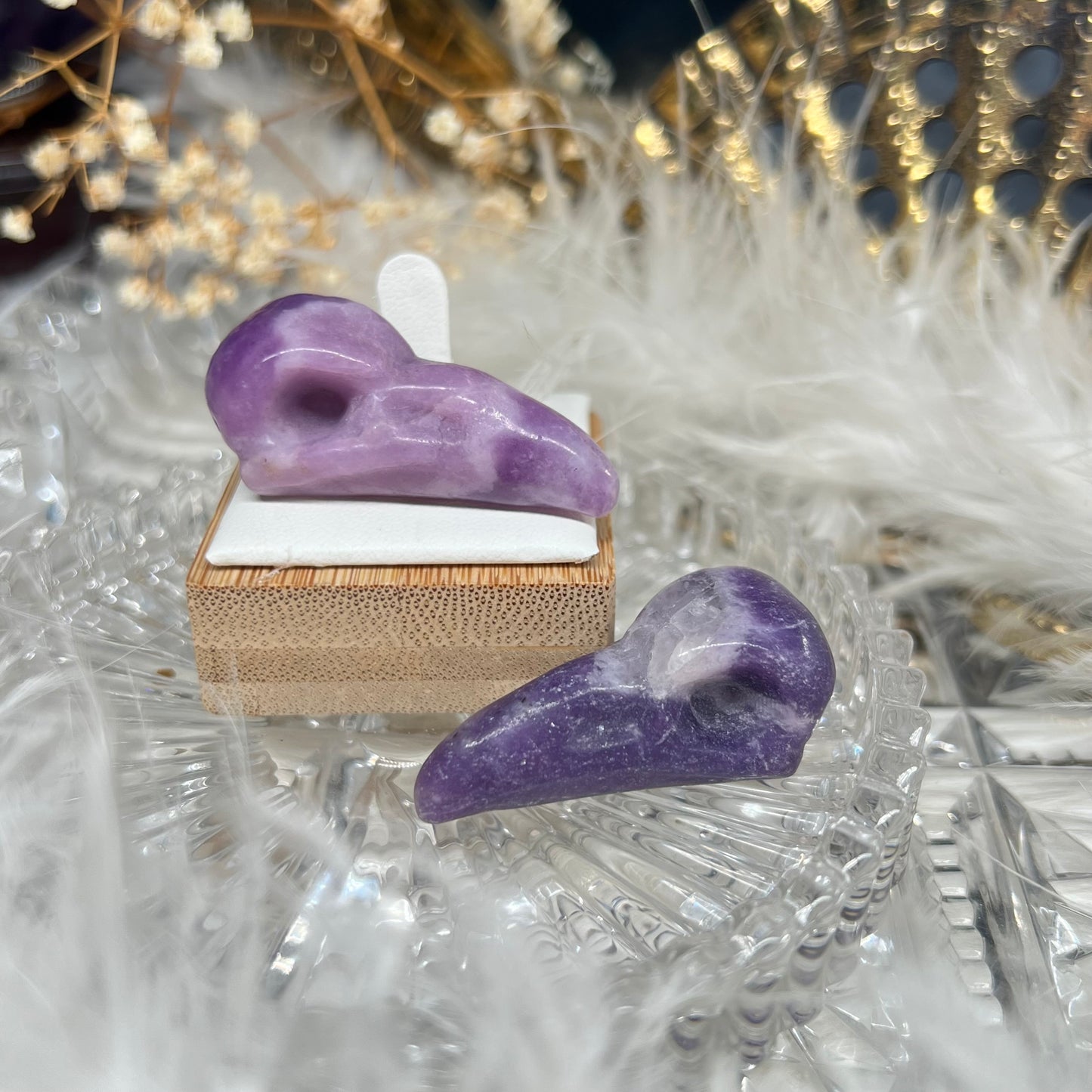 Raven lepidolite skull carving