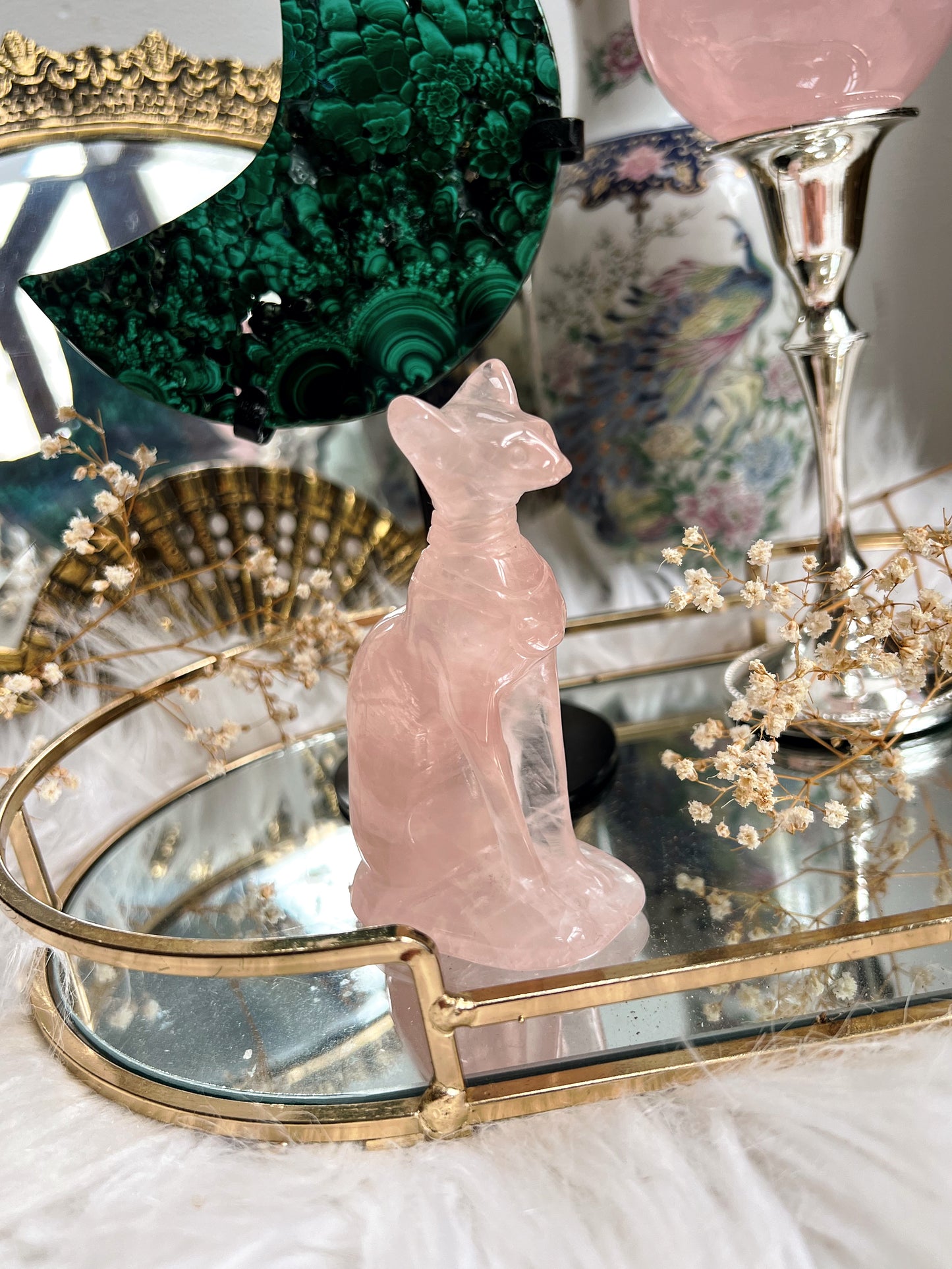 Rose quartz sphinx cat carving