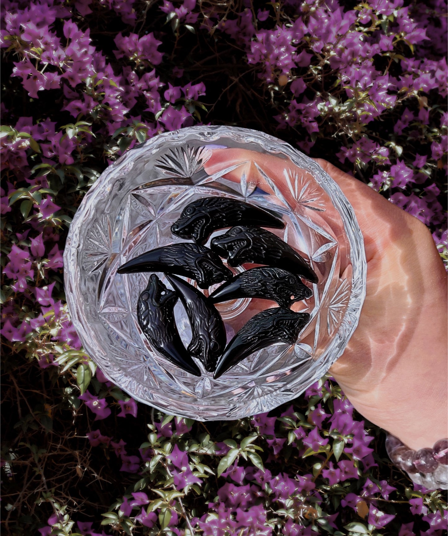 Black obsidian wolf head / tooth carving